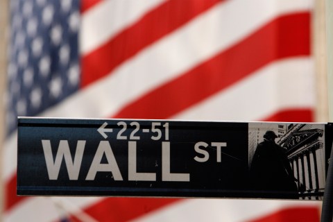 A Wall St. sign is seen outside of the New York Stock Exchange